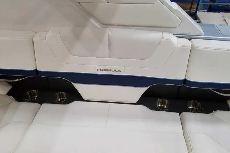 Slide: The Image of 2023 Formula 380 Super Sport Crossover OB interior seating with cup holders. - 20