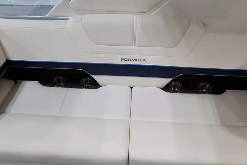 Slide: The Image of 2023 Formula 380 Super Sport Crossover OB interior seating with cup holders. - 21