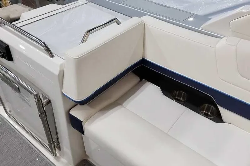 Slide: The Image of 2023 Formula 380 Super Sport Crossover OB interior seating with cup holders. - 28