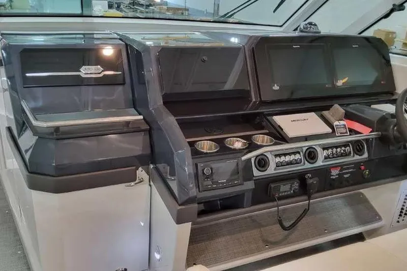 Slide: The Image of 2023 Formula 380 Super Sport Crossover OB dashboard with modern controls and displays. - 40