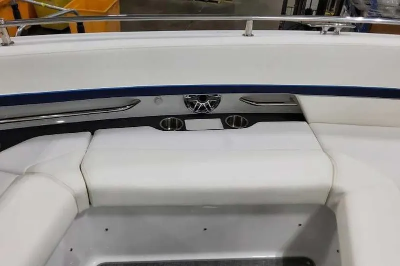 Slide: The Image of 2023 Formula 380 Super Sport Crossover OB interior with white seating and cup holders. - 47