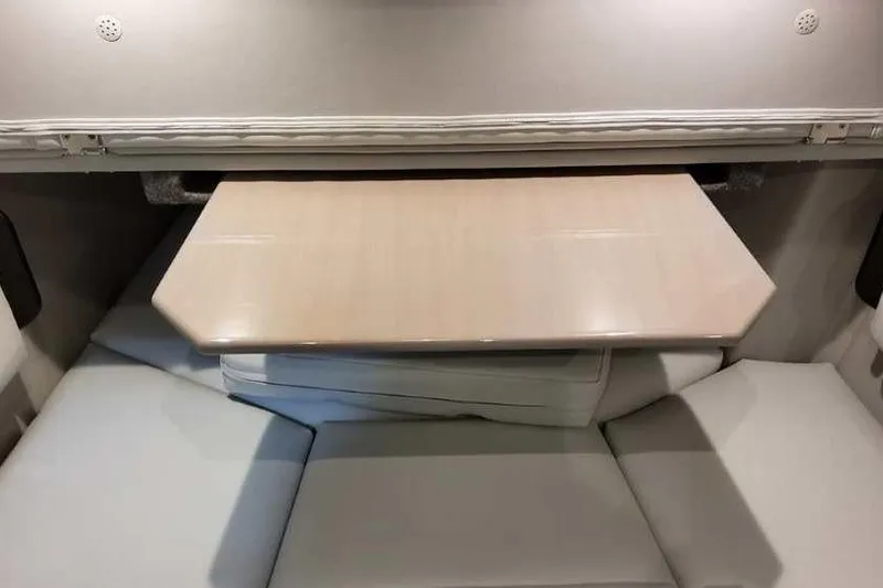 Slide: The Image of 2023 Formula 380 Super Sport Crossover OB interior with convertible seating and table. - 56