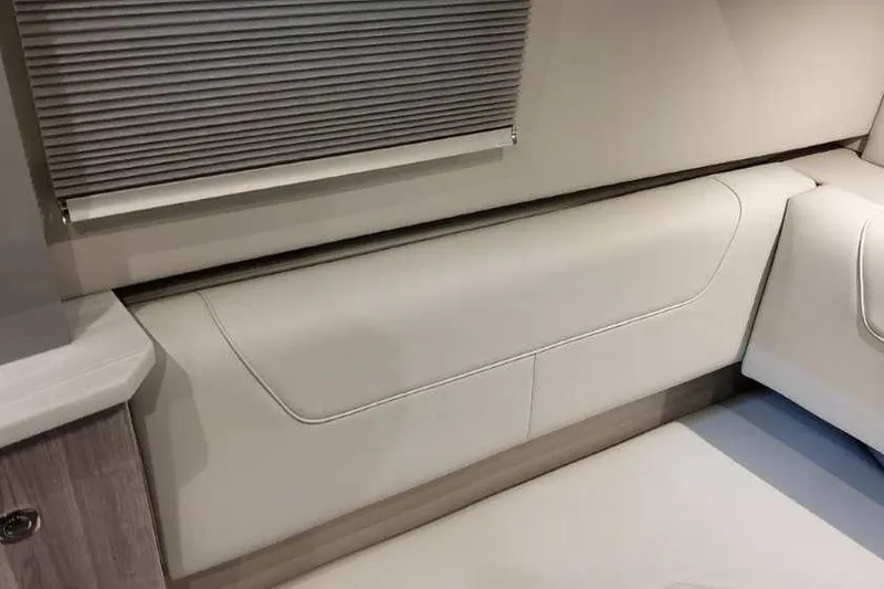 Slide: The Image of 2023 Formula 380 Super Sport Crossover OB interior with sleek, modern seating and window shade. - 58