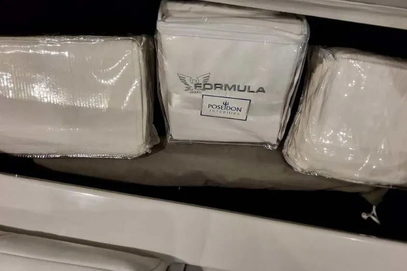 Slide: The Image of 2023 Formula 380 Super Sport Crossover OB interior packaging with Poseidon Interiors branding. - 61