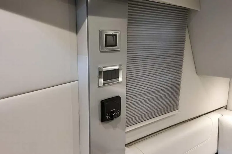 Slide: The Image of Interior controls of 2023 Formula 380 Super Sport Crossover OB, featuring modern design elements. - 62