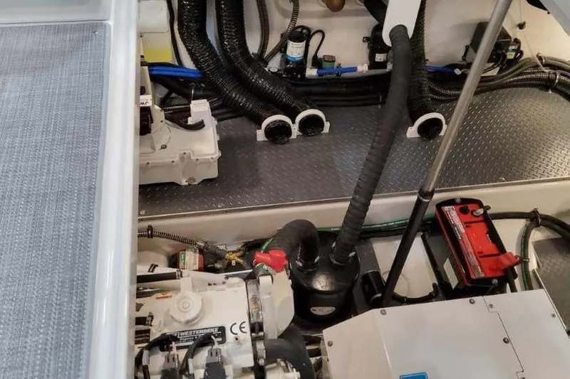 Slide: The Image of Engine compartment of 2023 Formula 380 Super Sport Crossover OB with visible components. - 87