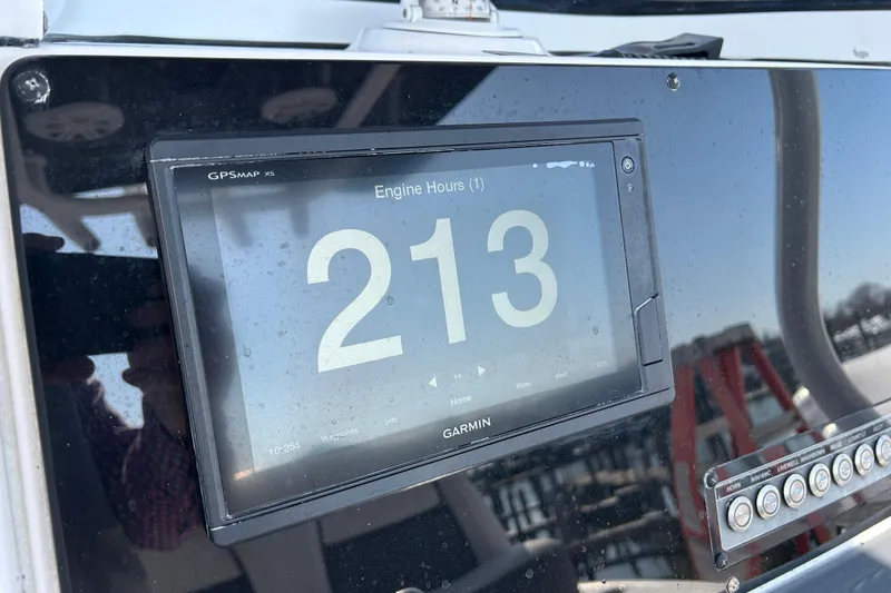 Slide: The Image of Garmin GPS display showing 213 engine hours on 2020 Tidewater 232 LXF boat. - 7