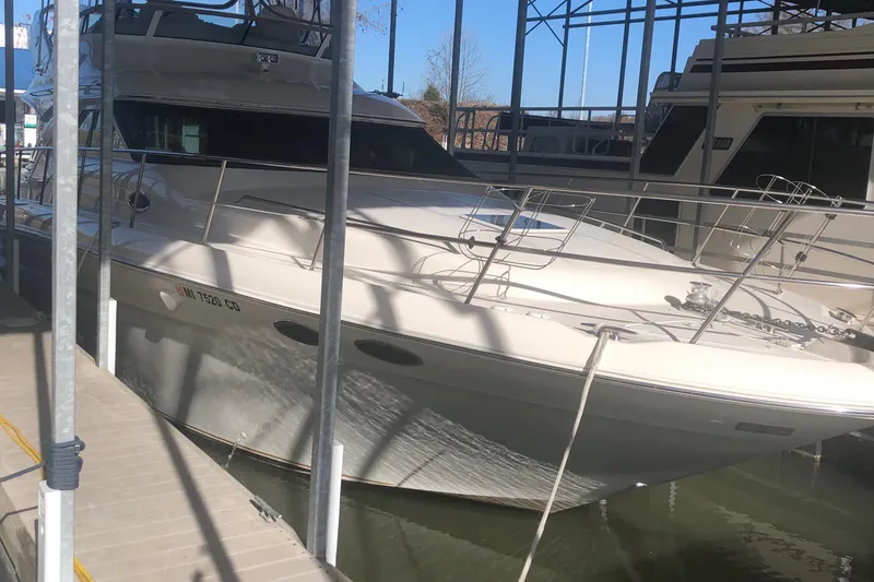 Slide: The Image of 2001 Sea Ray 400 Sedan Bridge yacht docked in marina. - 3