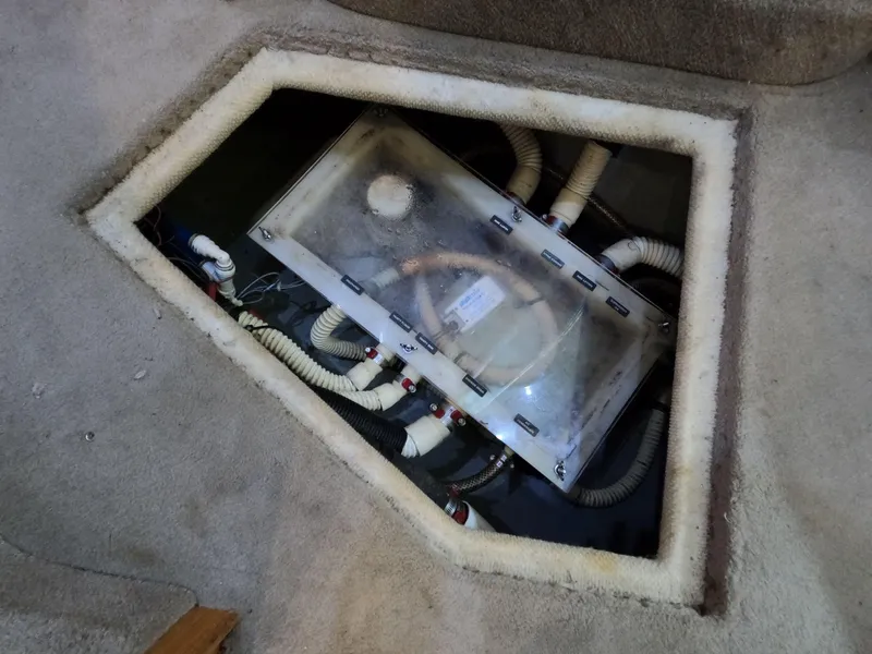 Slide: The Image of Access panel of 2001 Sea Ray 400 Sedan Bridge, showing internal wiring and components. - 62