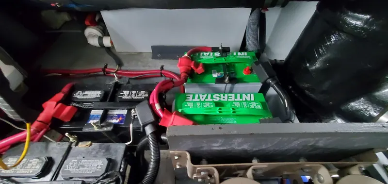 Slide: The Image of Battery compartment of 2001 Sea Ray 400 Sedan Bridge with Interstate batteries. - 68