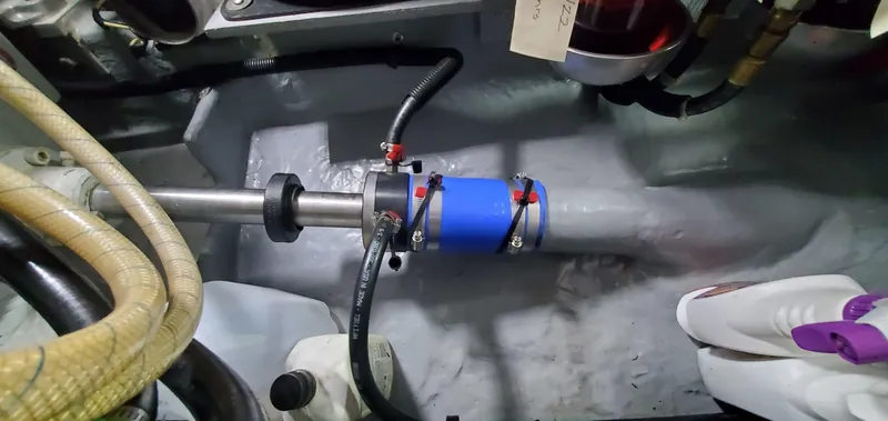 Slide: The Image of Engine room of 2001 Sea Ray 400 Sedan Bridge with visible shaft and components. - 71