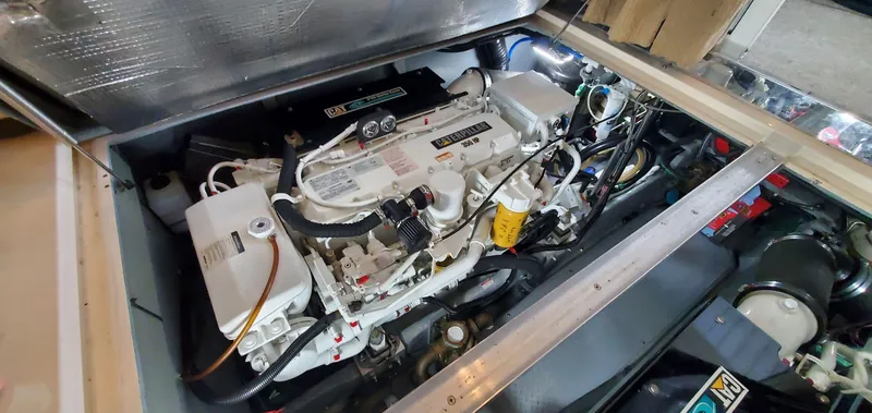 Slide: The Image of Engine compartment of a 2001 Sea Ray 400 Sedan Bridge yacht. - 78