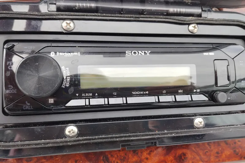 Slide: The Image of Sony DSX-M55 stereo system on a 2004 Formula 260 Bowrider boat dashboard. - 24