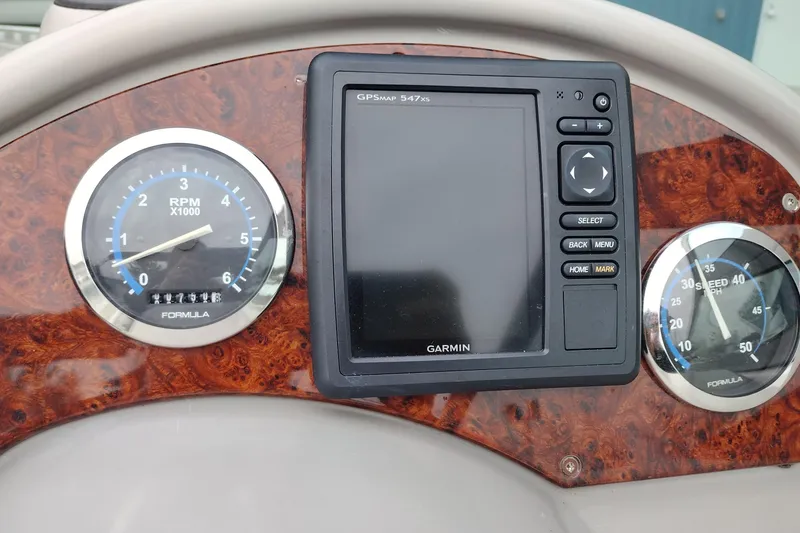 Slide: The Image of Dashboard of 2004 Formula 260 Bowrider with Garmin GPS and gauges. - 25
