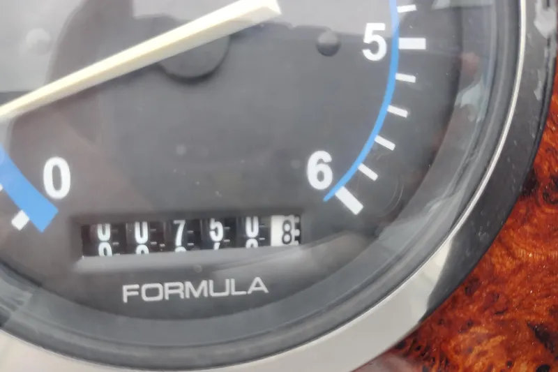 Slide: The Image of Close-up of a 2004 Formula 260 Bowrider tachometer displaying 758.8 hours. - 26