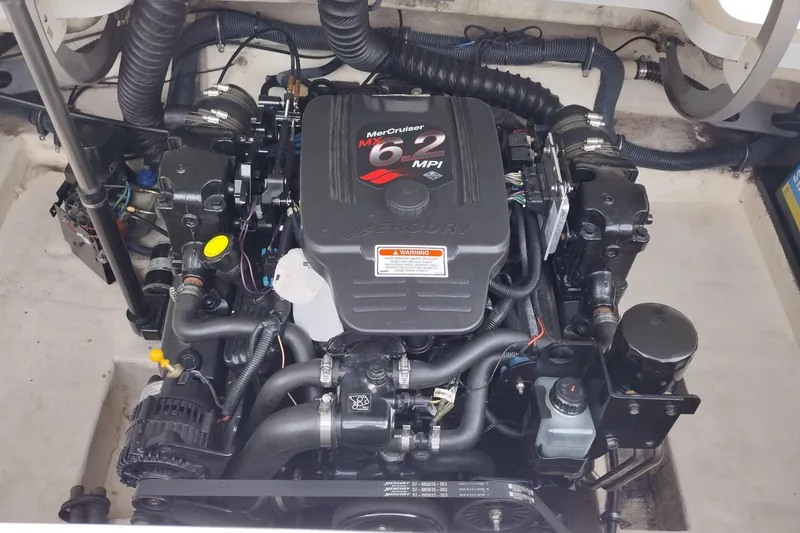 Slide: The Image of Engine of 2004 Formula 260 Bowrider boat, featuring MerCruiser 6.2 MPI. - 30