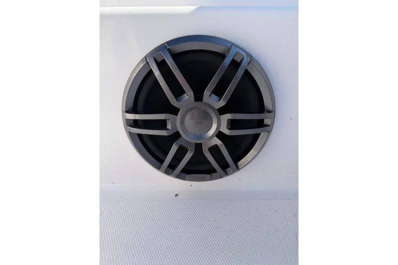 Slide: The Image of Close-up of a speaker on a 2022 Axopar 22 T-Top boat. - 10