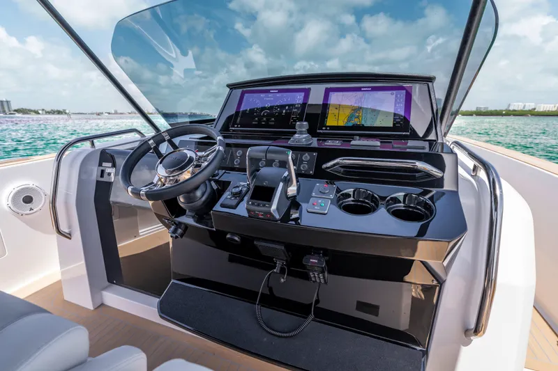 Slide: The Image of Cockpit of 2025 Pardo Yachts P38 with modern navigation displays and controls. - 31