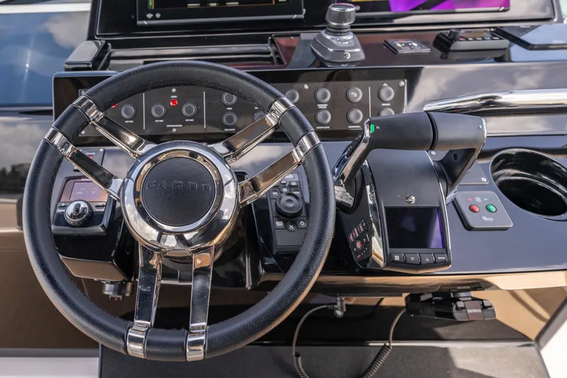Slide: The Image of Steering console of 2025 Pardo Yachts P38, featuring modern controls and sleek design. - 35
