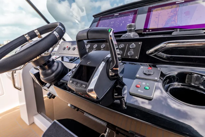 Slide: The Image of Helm of 2025 Pardo Yachts P38 with advanced navigation controls and displays. - 36