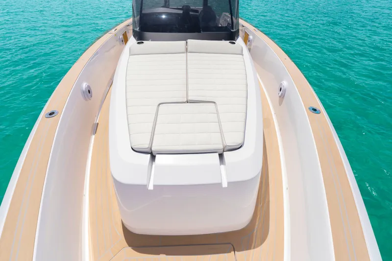 Slide: The Image of 2025 Pardo Yachts P38 luxury yacht with sunbed, cruising on turquoise waters. - 42