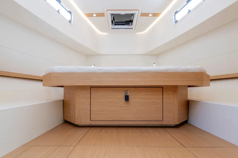 Slide: The Image of Luxurious interior cabin of 2025 Pardo Yachts P38, featuring sleek wood finishes and modern design. - 47