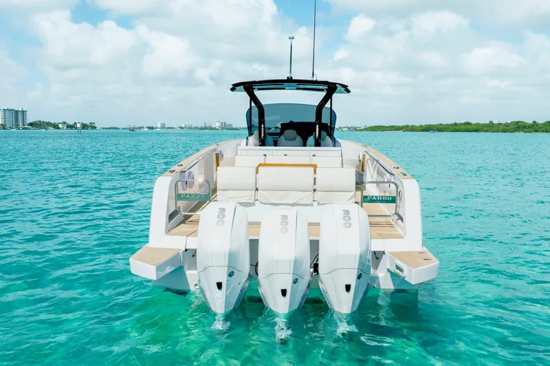 Slide: The Image of 2025 Pardo Yachts P38 with triple engines on turquoise water. - 9