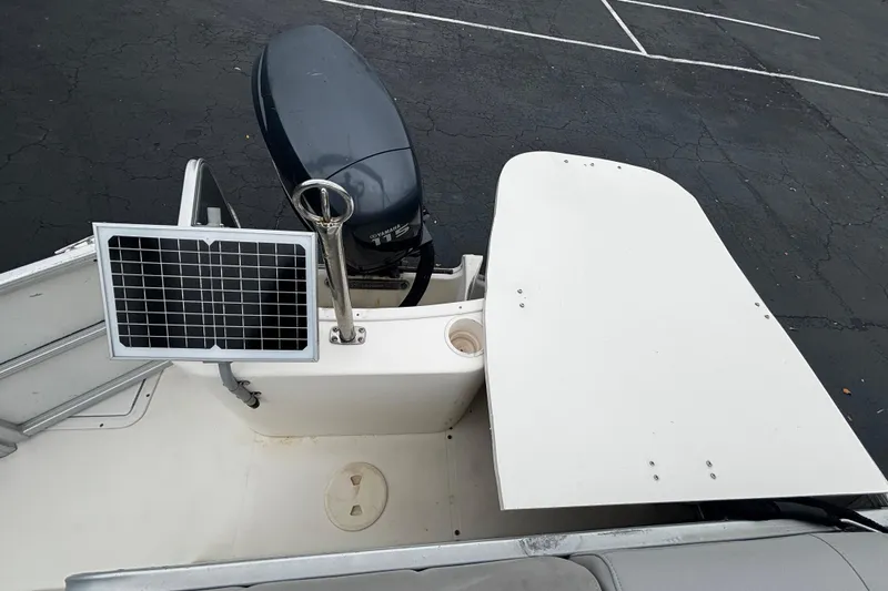 Slide: The Image of 2008 Hurricane FunDeck 226 REF-3 Gate boat with motor and solar panel. - 10