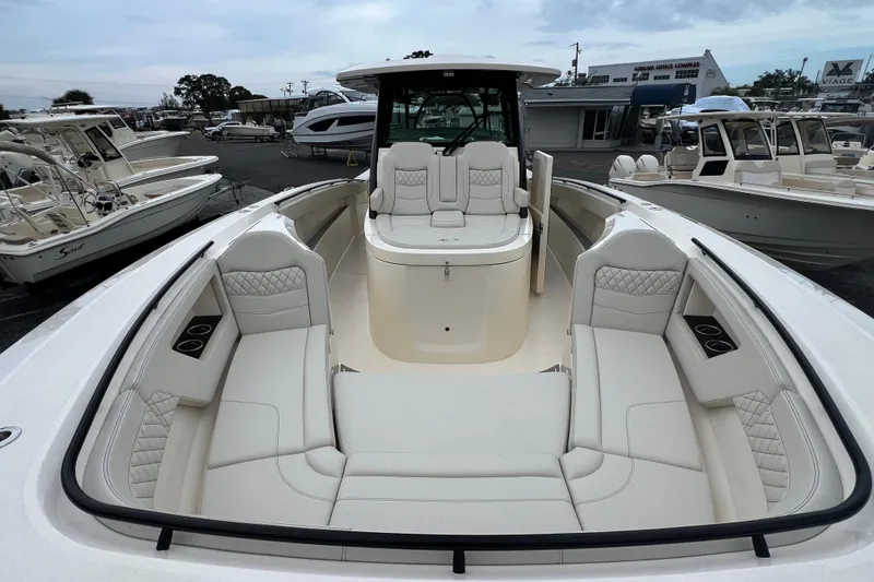 Slide: The Image of 2026 Scout 377 LXF luxury boat with spacious seating and modern design. - 14