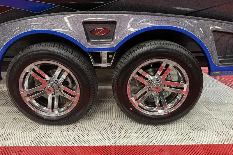 Slide: The Image of Ranger Z519 Cup-Equipped 2026 with shiny chrome wheels. - 11