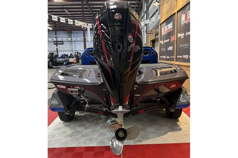 Slide: The Image of Ranger Z519 Cup-Equipped 2026 boat in a showroom. - 16