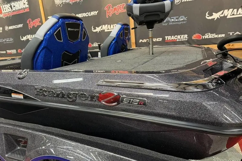 Slide: The Image of 2026 Ranger Z519 Cup-Equipped boat with blue seats. - 9