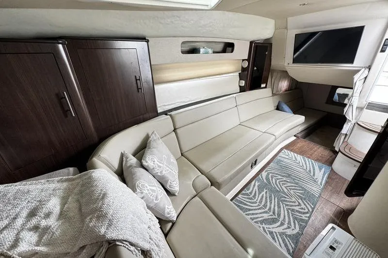 Slide: The Image of Luxurious interior of 2018 Regal 35 Sport Coupe with modern seating and decor. - 38