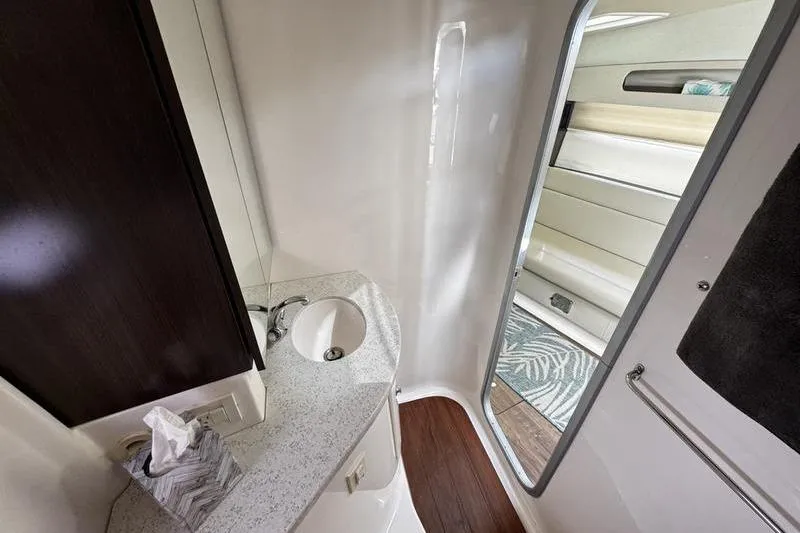 Slide: The Image of 2018 Regal 35 Sport Coupe bathroom interior with modern sink and sleek design. - 45