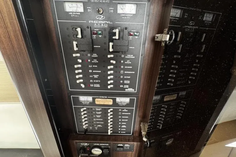 Slide: The Image of Electrical control panel of 2018 Regal 35 Sport Coupe boat. - 46
