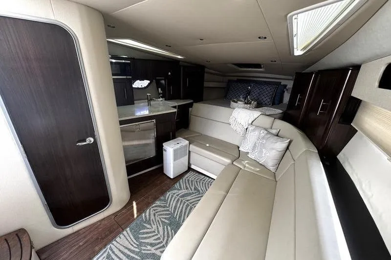 Slide: The Image of Luxurious interior of 2018 Regal 35 Sport Coupe with modern amenities and elegant design. - 48