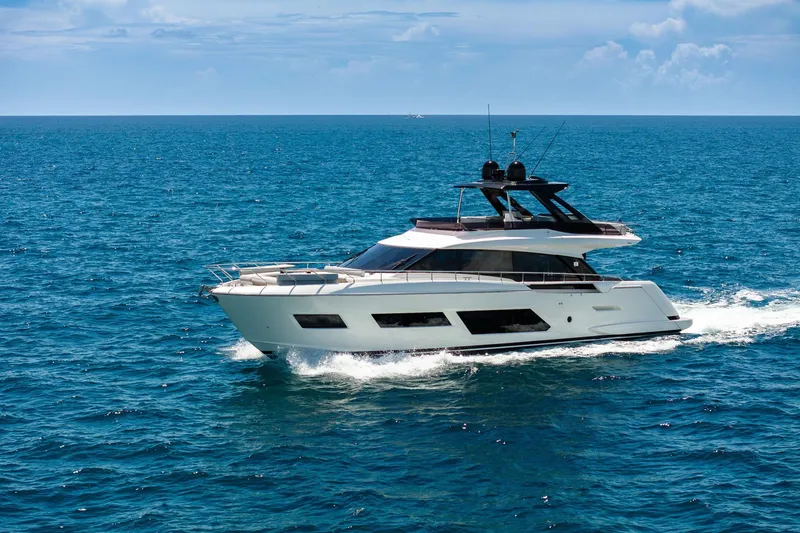 Slide: The Image of Luxurious 2022 Ferretti Yachts 670 cruising on open blue sea. - 4