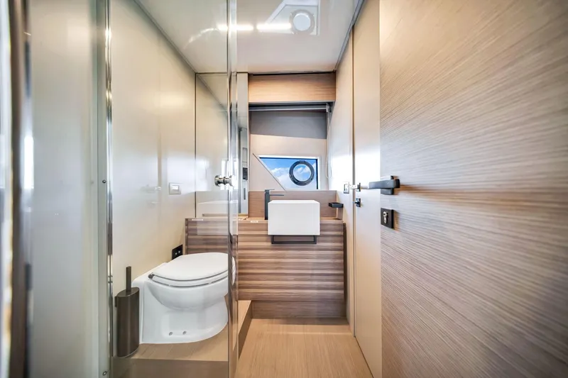 Slide: The Image of Luxurious bathroom interior of 2022 Ferretti Yachts 670, featuring modern fixtures and elegant design. - 52