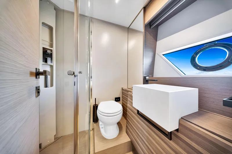 Slide: The Image of Luxurious bathroom interior of 2022 Ferretti Yachts 670 with modern fixtures and ocean view. - 53