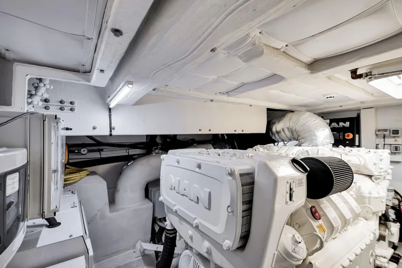 Slide: The Image of Engine room of 2022 Ferretti Yachts 670, featuring MAN engines and modern equipment. - 65