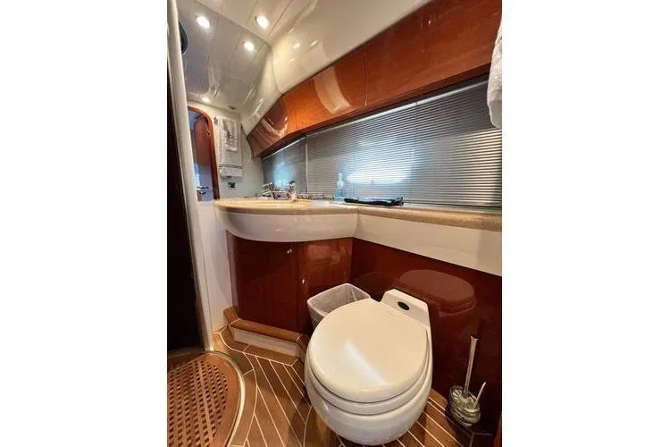 Slide: The Image of Luxurious bathroom in 2003 Viking Princess 50 Sport Cruiser yacht with modern fixtures. - 15