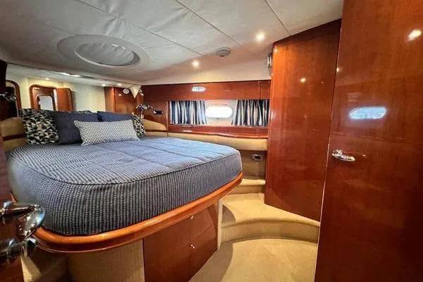 Slide: The Image of Luxurious cabin interior of 2003 Viking Princess 50 Sport Cruiser yacht. - 25