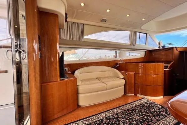 Slide: The Image of Luxurious interior of 2003 Viking Princess 50 Sport Cruiser with elegant wood finishes. - 41