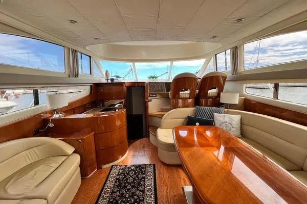 Slide: The Image of Luxurious interior of 2003 Viking Princess 50 Sport Cruiser with elegant wood finishes. - 47