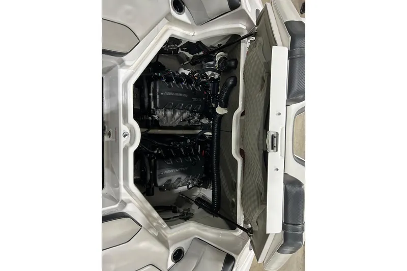 Slide: The Image of Engine compartment of a 2019 Yamaha Boats 212X, showcasing dual high-output engines. - 17