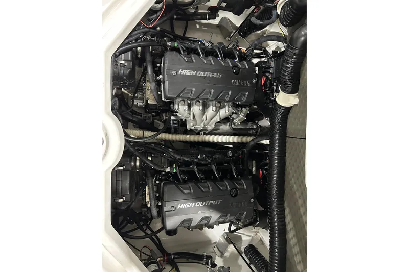 Slide: The Image of 2019 Yamaha Boats 212X high output engines in engine compartment. - 18