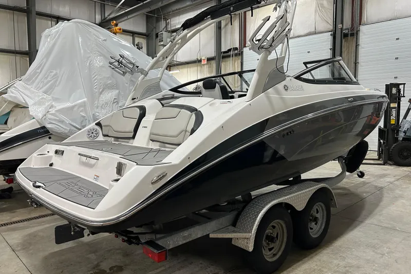 Slide: The Image of 2019 Yamaha Boats 212X on trailer in indoor storage facility. - 3