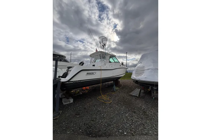 Slide: The Image of Interior view of 2010 Boston Whaler 345 Conquest boat with luxurious seating. - 19