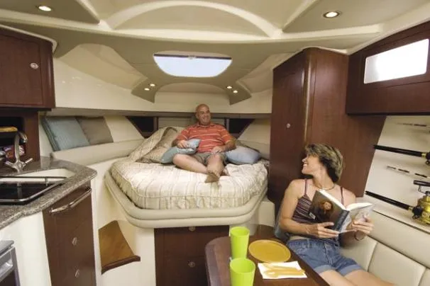 Slide: The Image of 2010 Boston Whaler 345 Conquest boat exterior under cloudy sky. - 2