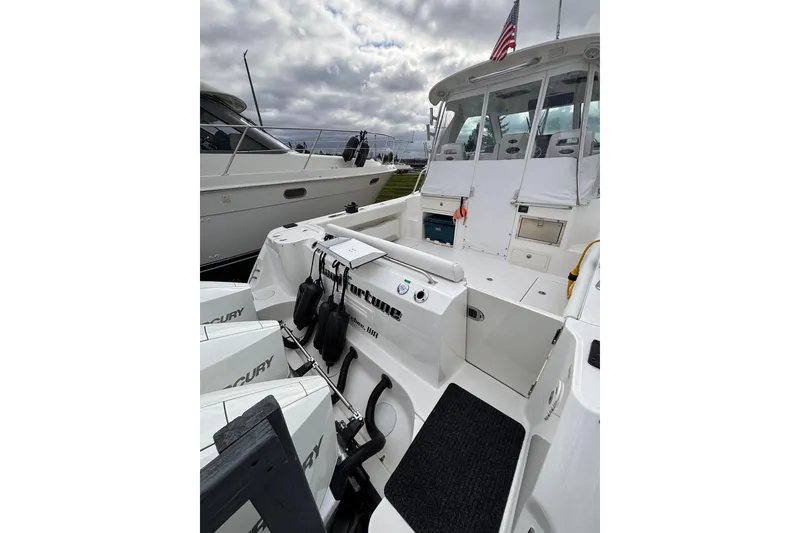 Slide: The Image of Interior view of 2010 Boston Whaler 345 Conquest helm with navigation equipment. - 20